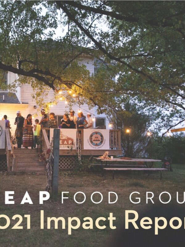 REAP Food Group 2021 Impact Report with image of people standing on a porch during an event.